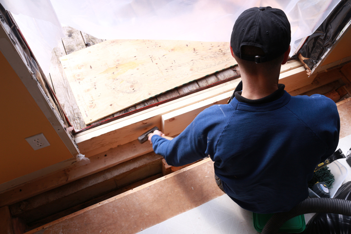 New header plate being installed